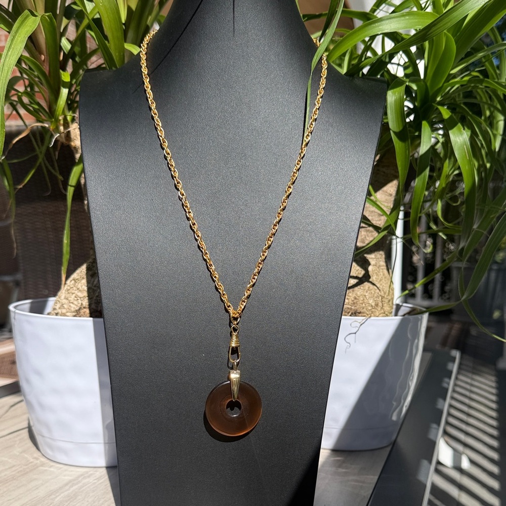 Vintage CROWN TRIFARI chocolate glass donut pendant goldtone necklace